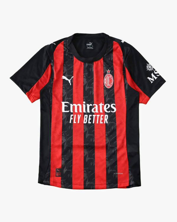 AC Milan 2025/26 official home jersey in red and black stripes.