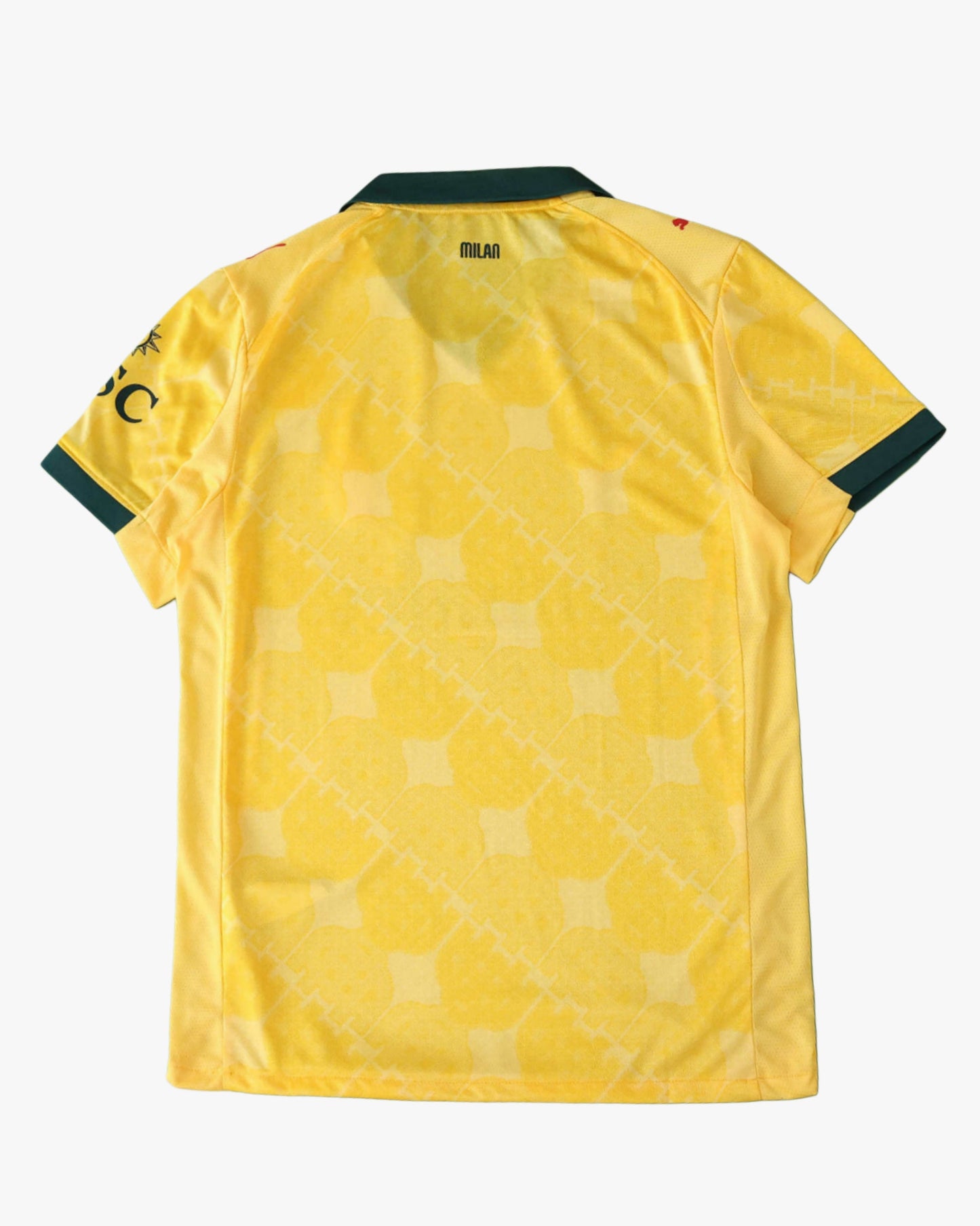 AC Milan 2025/26 third jersey in yellow with green collar and sleeve trim.