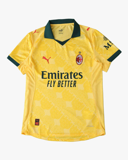 AC Milan 2025/26 third jersey in yellow with green collar and sleeve trim.