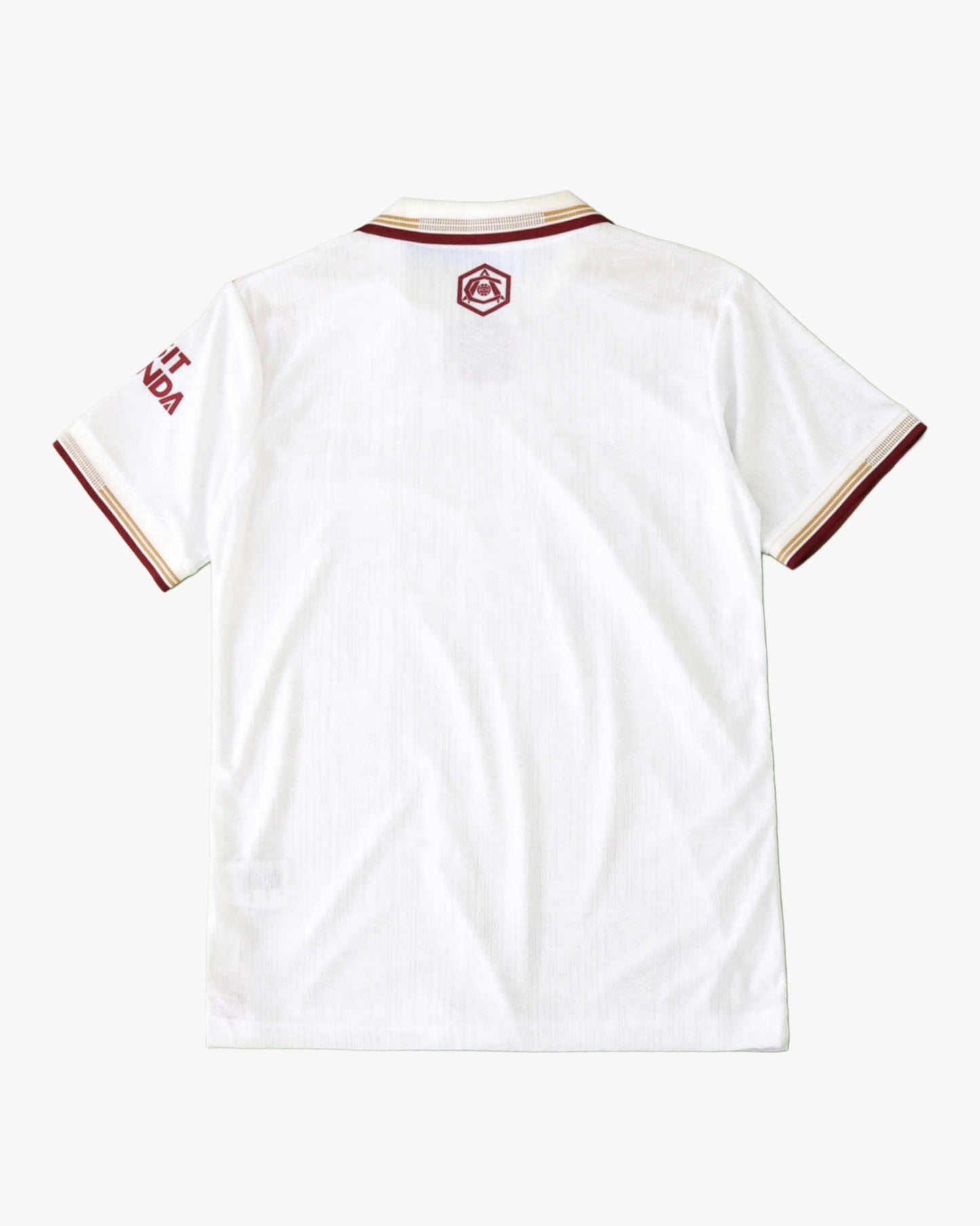 White Arsenal third kit 2025/26 jersey with maroon and gold trim.