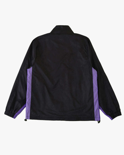 Black Footxo Barcelona training windbreaker with purple side panels.