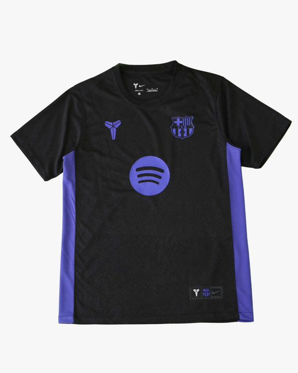 Black and purple Barcelona away jersey with Mamba logo and Spotify logo.