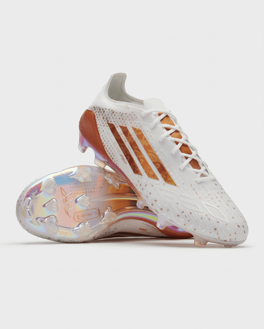 White adidas F50 Elite FG Salah AFCON football boots 2025 with copper-bronze stripes and iridescent soleplate