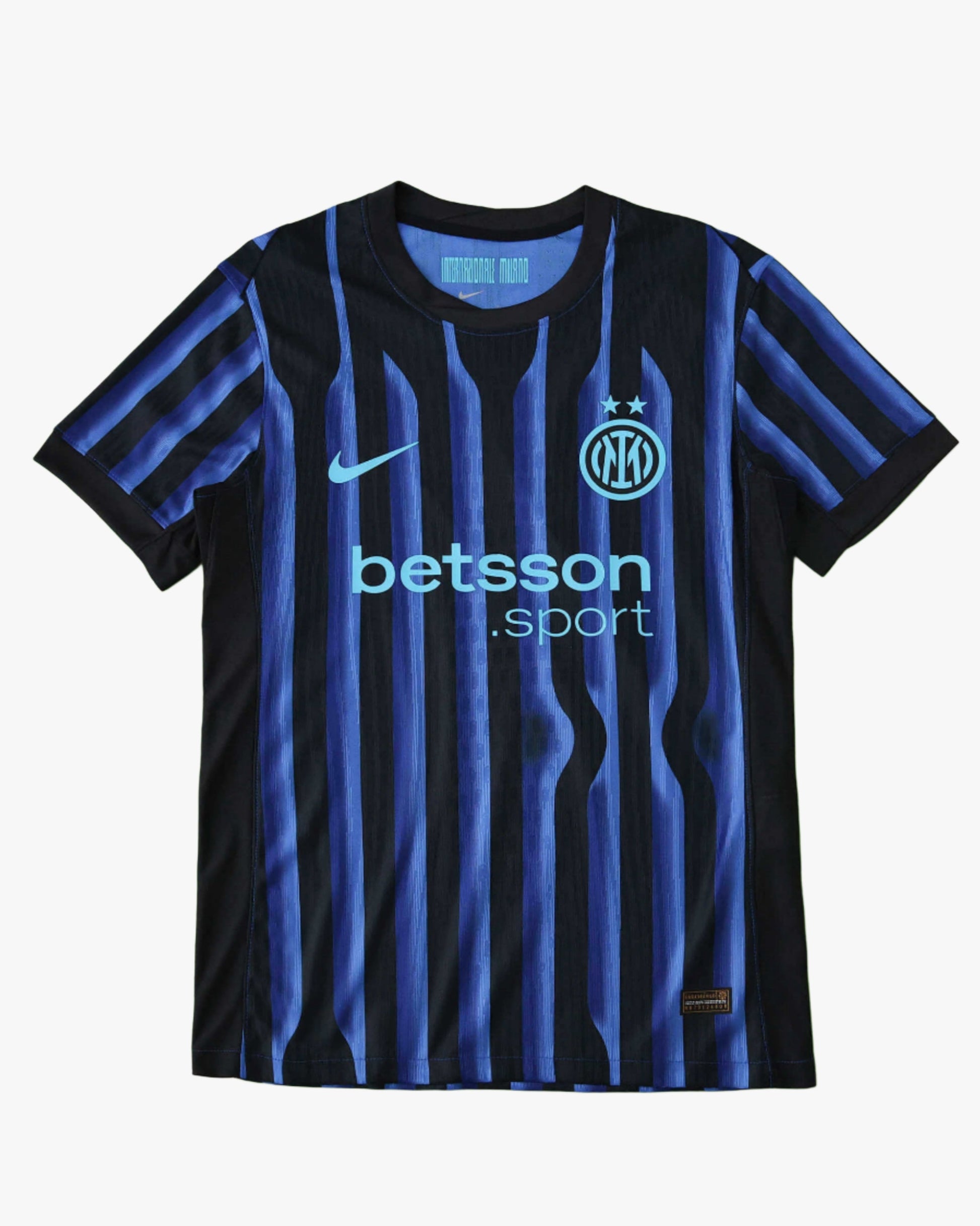 Inter Milan 2025/26 home jersey with black and blue stripes.