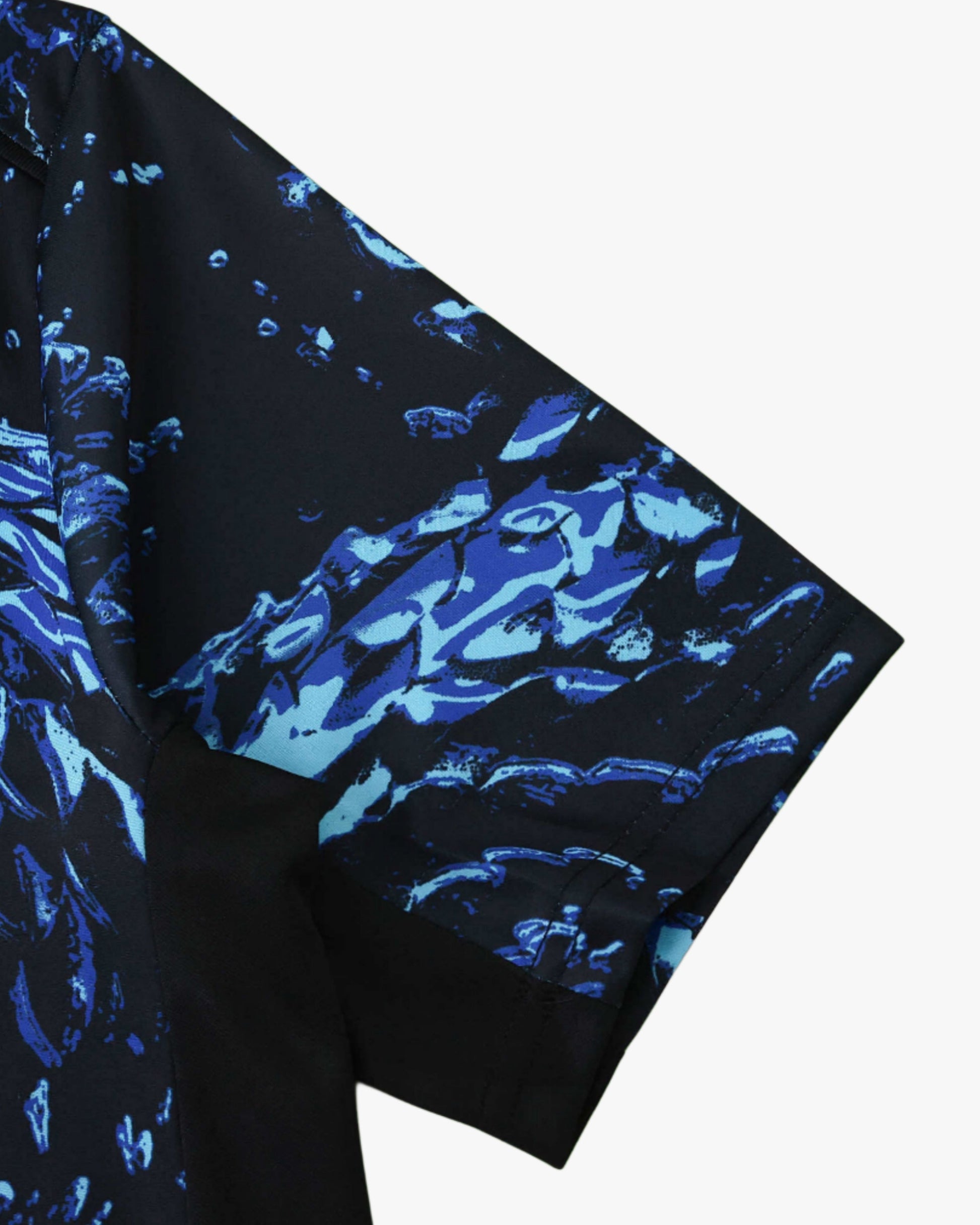 Black short-sleeved shirt with blue abstract print.