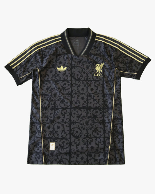 Liverpool x LFSTLR football kit with ornate black and gold pattern.