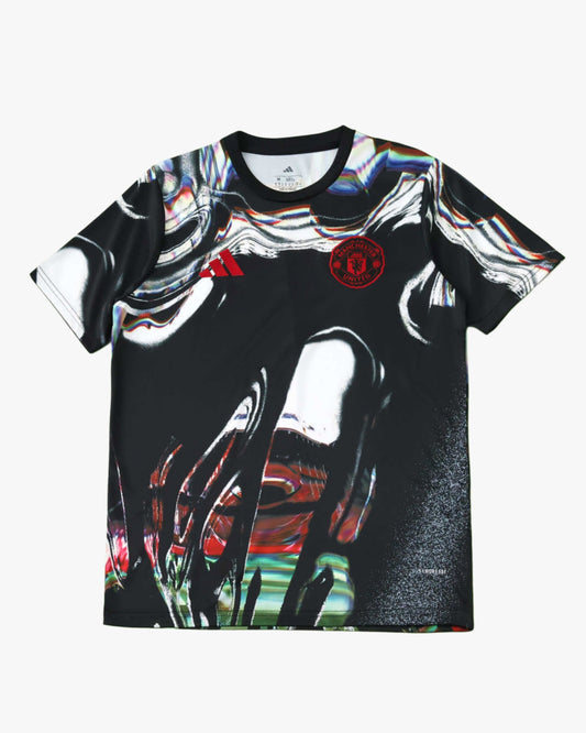 Manchester United 2025/26 pre-match jersey with abstract graphic print.