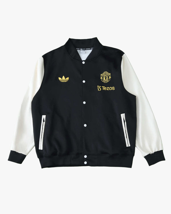 MANCHESTER UNITED x VARSITY WINDBREAKER 2025/26 - Footxo