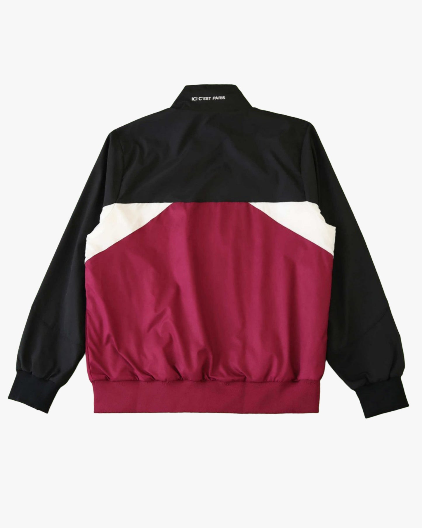 Black, white, and burgundy color-blocked Jordan x PSG windbreaker jacket.