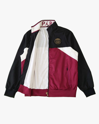 Jordan x PSG black, white, and burgundy color-blocked windbreaker jacket.