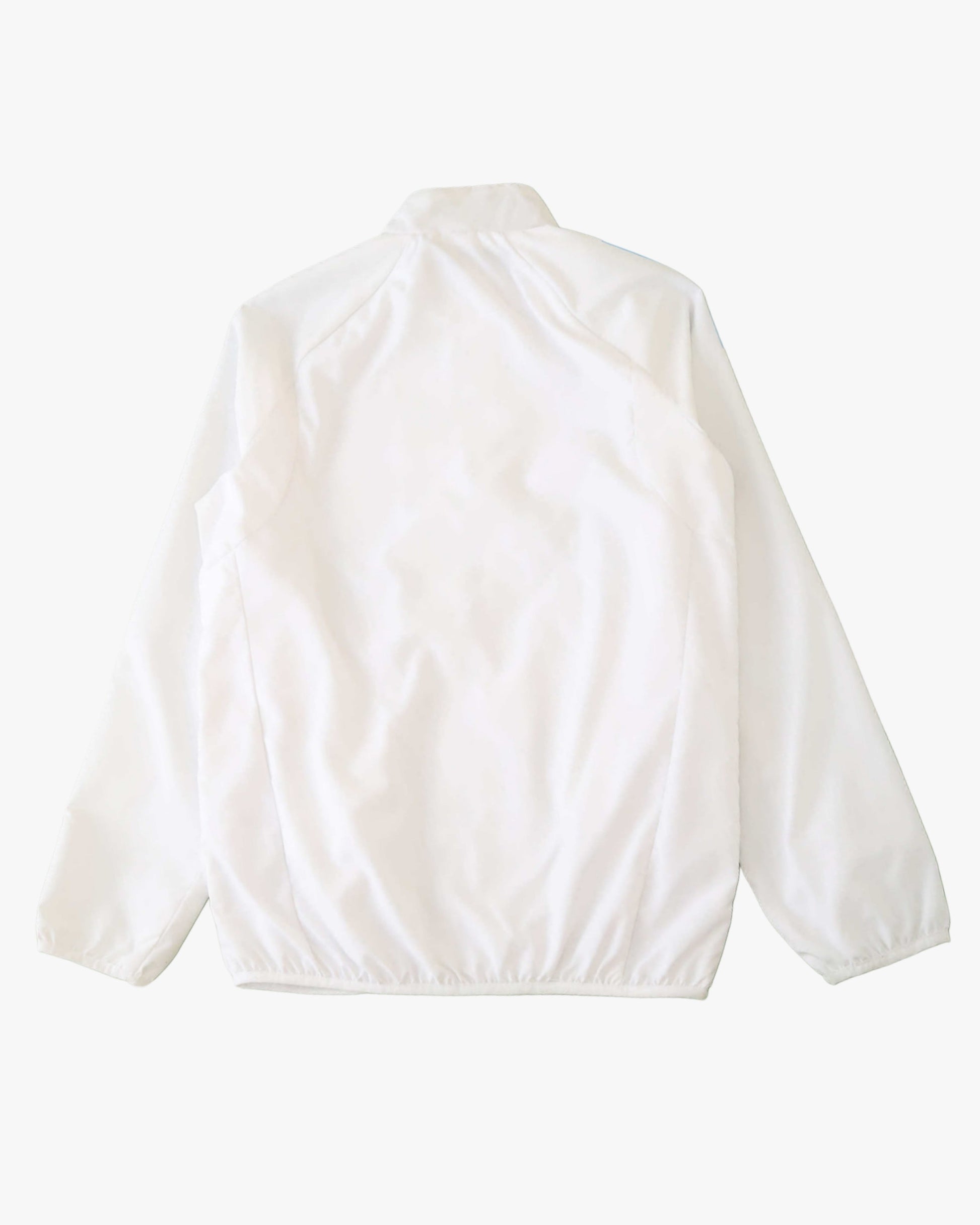 Back view of a white Real Madrid training windbreaker jacket.