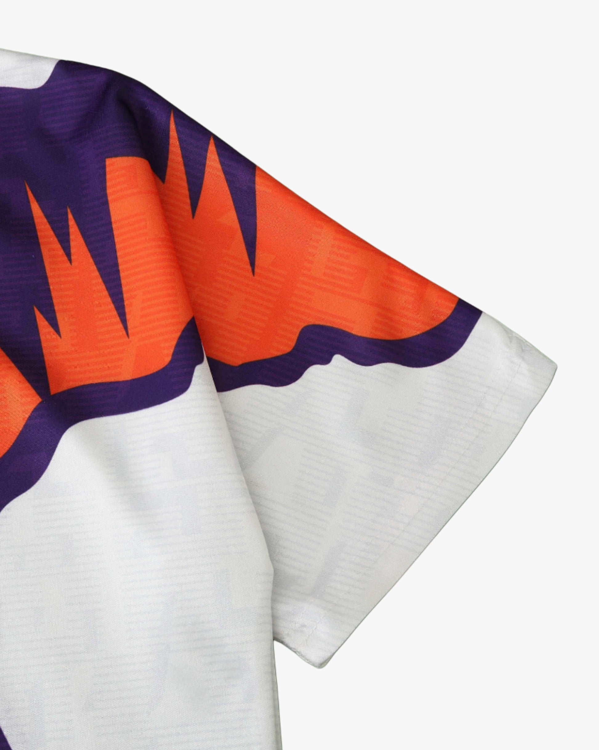 Footxo Scotland 1992/93 retro away football shirt with purple and orange graphic pattern.
